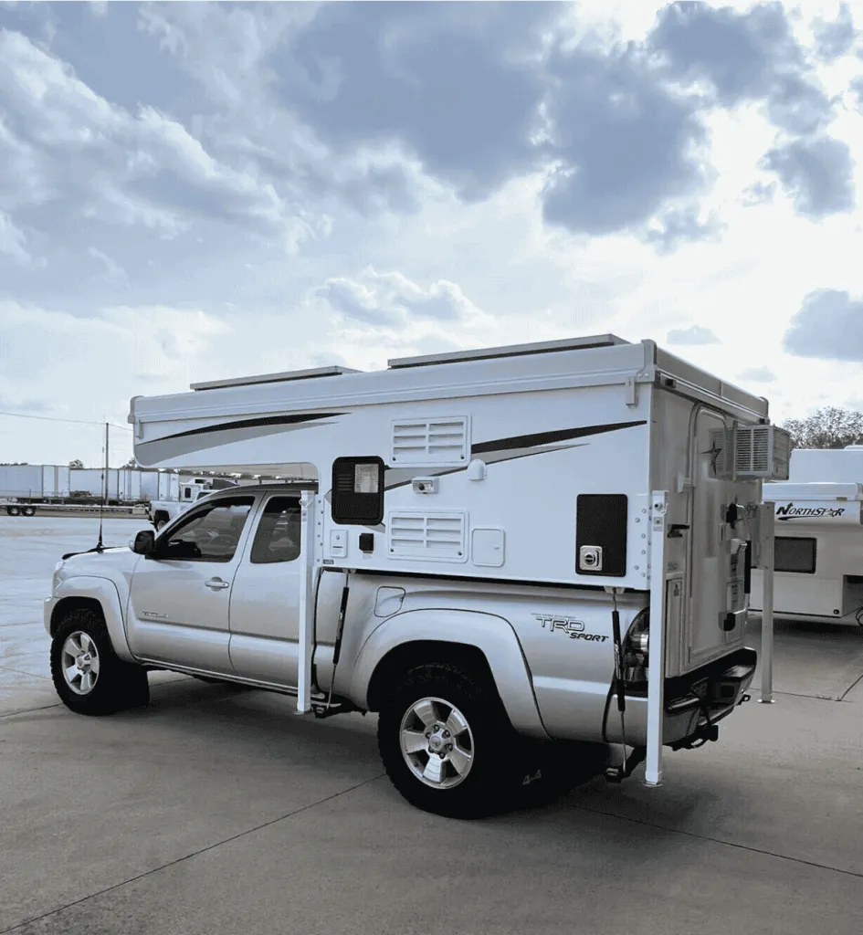 Northstar Camper 600SS-001 Northstar Camper 600SS installed on truck in outside parking lot